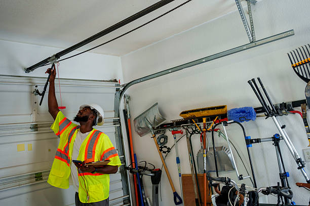 Professional Garage Door Installation technician working in Milton, FL